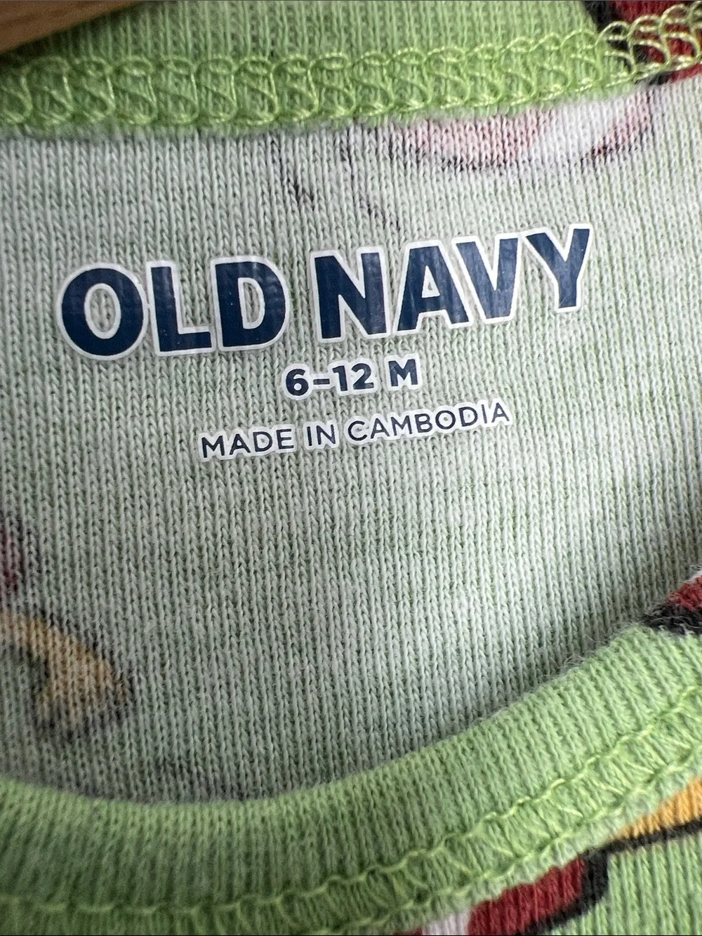Old Navy | Green Football-Print Long-Sleeve Baby One-Piece 6-12 Months